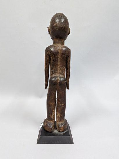 null Burkina Faso
Large Lobi statue with arms along the body, wood with brown patina.
H....