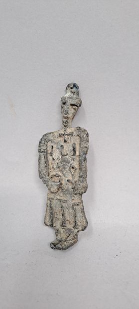 null Lead from the Seine. Statuette representing a figure wearing a crown.
France,...