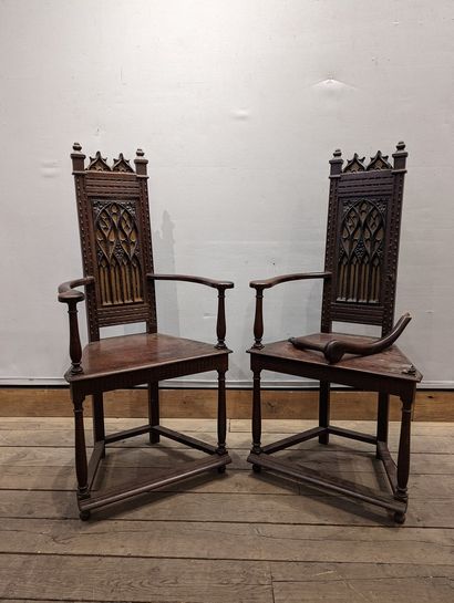 null Pair of chairs called caquetoires in wood. Gothic style backrest; curved armrests...
