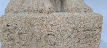 null Granite group carved in the round representing a man wearing a cape, an animal...