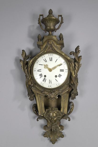 null Gilt bronze wall clock decorated with acanthus leaves, drapery and mascaron,...