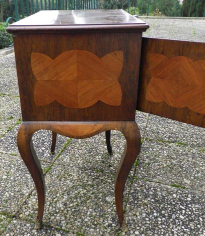 null Small piece of furniture in wood veneer opening by two doors with butterfly...