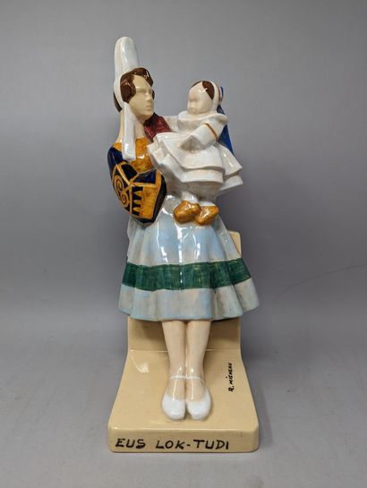 null QUIMPER - MICHEAU-VERNEZ Robert (1907-1989)
Group in polychrome earthenware...