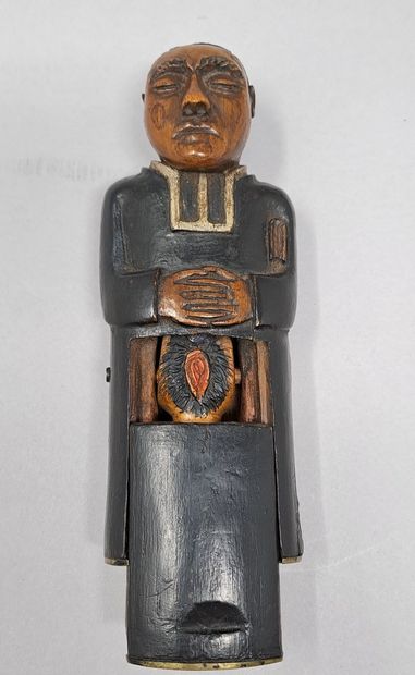null CURIOSA
Lecherous priest, in polychrome wood and brass base. A slide in his...