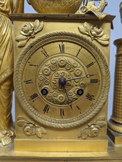 null Restoration period clock in gilt bronze, the dial inscribed in a terminal surmounted...