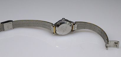 null OMEGA
Ladies' wristwatch, round case, cream dial with baton markers. Date window...