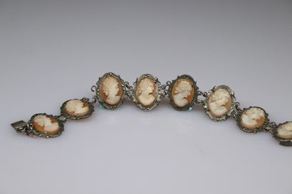 null Silver bracelet and marcasite decorated with cameos shells. 
Gross weight: 17.66...