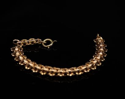 null 18k (750) rose gold chain with fancy stitches. The clasp in 18k yellow gold....
