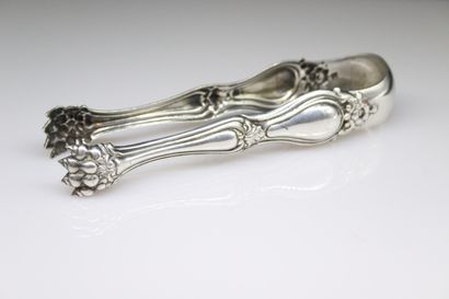 null Sugar tongs in silver plated metal with lateral decoration of a flower and a...