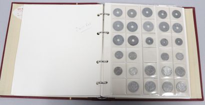 null Binder containing a collection of about 200 French silver and base metal coins,...