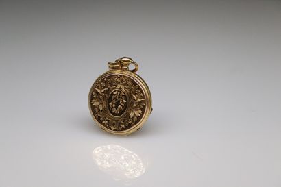 null Secret pendant in 18k (750) gold, decorated with a floral composition in medallion...