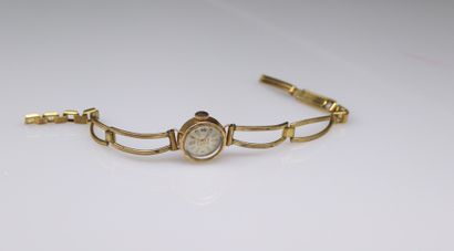 null MICHAUD 
Montre bracelet de dame, boîtier rond en or jaune 18k (750), cadran...