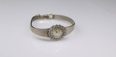null BERNEY BLONDEAU 
Montre bracelet de dame, boîtier ovale en or gris 18k (750),...