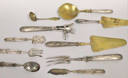 null Set of silver cutlery (Minerva) :
- four Louis XVI style candy cutlery, the...