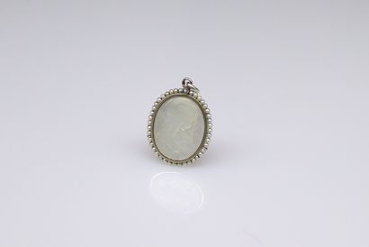 null Baptismal medallion in 18k (750) white gold with a mother-of-pearl plaque representing...