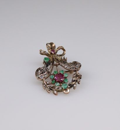 null Metal pendant-brooch forming a crown of foliage adorned with rubies, emeralds...