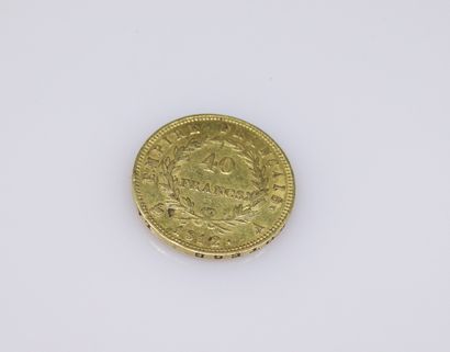 null Gold coin of 40 Francs Napoleon head (1812).
Weight : 13.2 g.