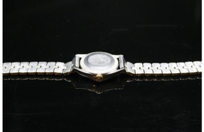 null BAUME&MERCIER
Ladies' wristwatch in gold and silver-plated metal, black dial,...