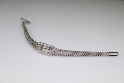 null OMEGA
Montre bracelet de dame, boîtier rectangulaire en or gris18K (750) ornée...