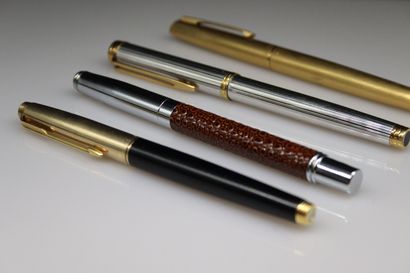 null WATERMAN- PARKER- 
Lot of pens including :
-A silver and vermeil fountain pen....