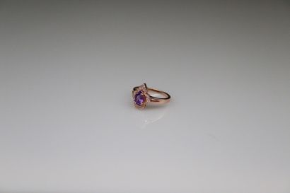 null Ring in pink vermeil 925° centered of a pear amethyst in a surround of white...