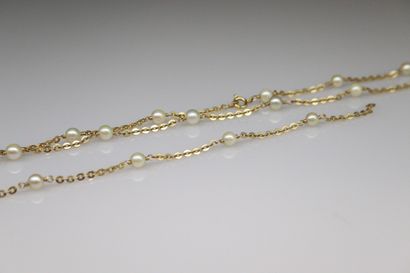 null Half set including a bracelet and a necklace in 18k yellow gold (750) completed...