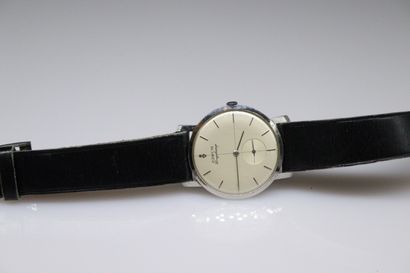 null CORUM 
Men's wristwatch, round metal case, cream dial, baton index and second...