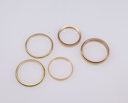 null Lot of 5 wedding rings in yellow and pink gold 18k (750).
Weight : 14.7 g.