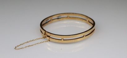 null Rigid bracelet in yellow gold 18k (750). 
Weight : 11.20 g. 
(Restorations)