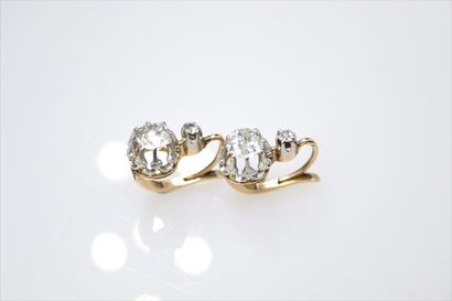 null Pair of 18k (750) yellow and white gold dormeuse set with old cut diamonds.
Gross...
