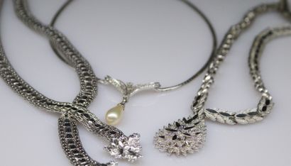 null Lot of three silver metal necklaces, one negligee type decorated with white...