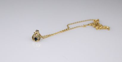 null A chain and a pendant in 18k (750) yellow gold. The pendant is decorated with...