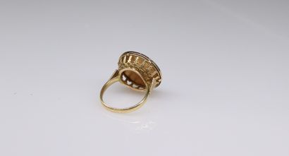 null Ring in 18k (750) yellow gold set with a 20 francs Coq gold coin. 
Finger size...