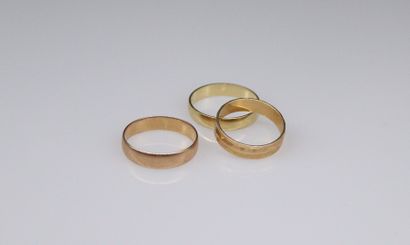 null Lot of three 18k (750) yellow and pink gold wedding rings. 
Gross weight: 9.01...