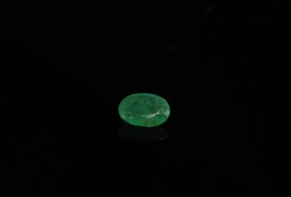 Oval emerald on paper. 
Probably Zambia....