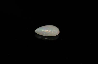 White pear cabochon opal on paper. 
Weight...
