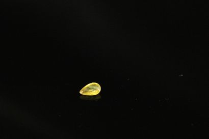 null Pear yellow sapphire on paper. 
Weight : 0.68 ct. 

Dimensions : 7mm x 4.3m...