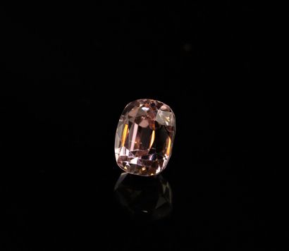 null Kunzite cushion on paper. 
Weight : 12.14 cts.