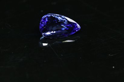 Tanzanite pear on paper. 
Accompanied by...