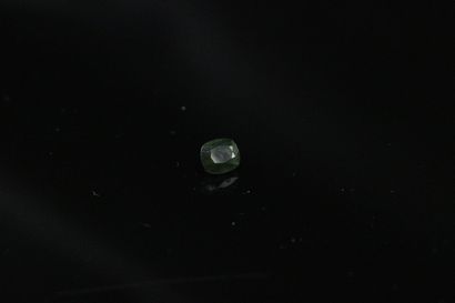 null Cushion sapphire on paper. 
Weight : 1.58 ct. 

Dimensions : 6.5mm x 5.5mm