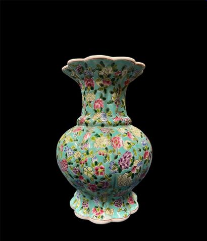 null A turquoise porcelain underglaze baluster vase with a polychrome enamelled decoration...