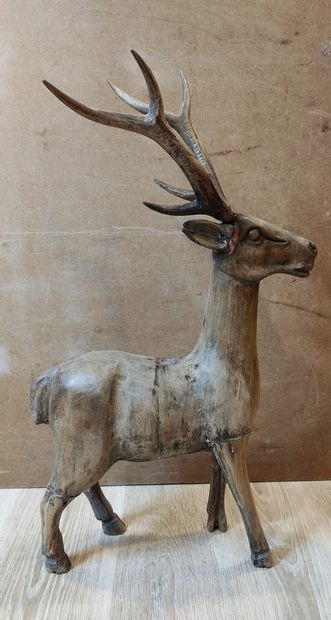 null 2 stags in carved wood, raw, not varnished 
one lying down, 32 x 50 x 15 cm
the...