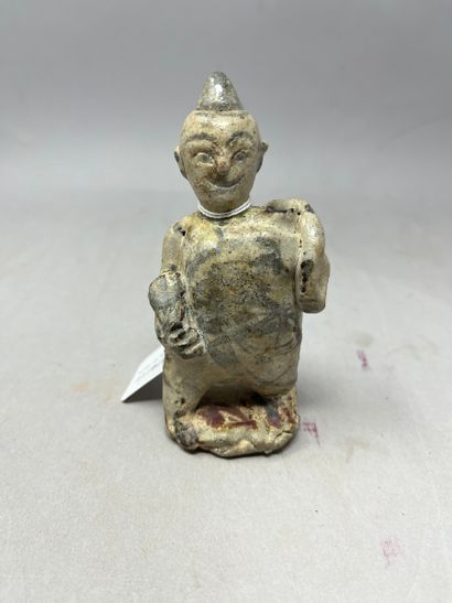 null Enamelled terracotta figure 
China
H. 11,5 cm