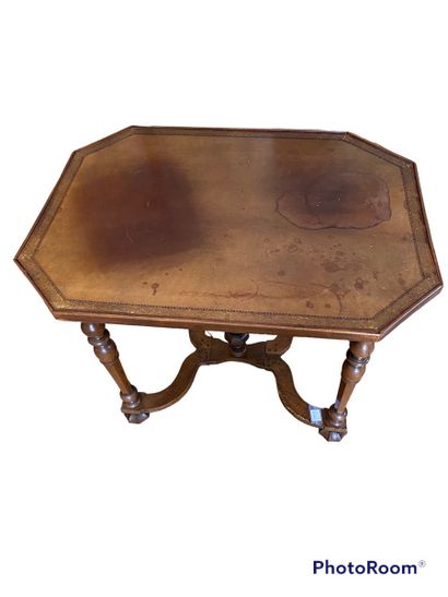null Octagonal writing table
Leather top, tapered and fluted legs joined by an "X"...