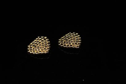 null YVES SAINT LAURENT
Circa 1980

Rare pair of gold-plated heart-shaped ear clips....