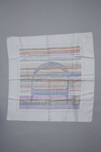 null CHRISTIAN DIOR 

Blue silk scarf with orange, green and purple prints forming...