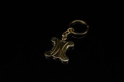 null CELINE

Key ring in gilded metal model "Triumph" typical of the House signed...