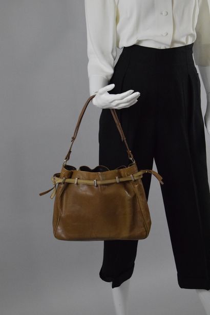 null LANCEL 
Circa 1970

Beige shoulder bag with exotic leather details on some straps...