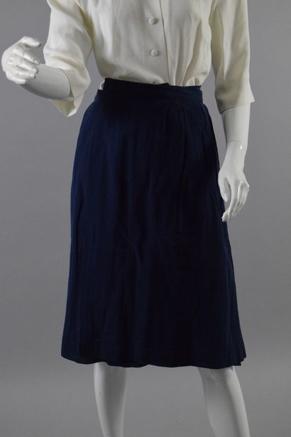 null EMMANUELLE KHAN 

Partially pleated wrap skirt in navy blue. 
Slight wear. 
Size:...