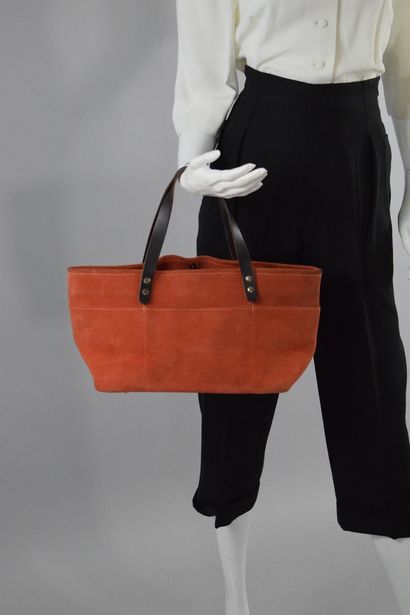 null LAMARTHE, TAMPICO

Lot of two suede bags, one chocolate, the other orange. 
The...